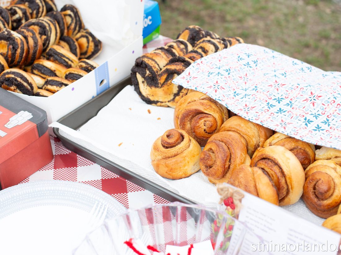 A Slavic table spread — pelmeni, pierogi, salads, and kvass