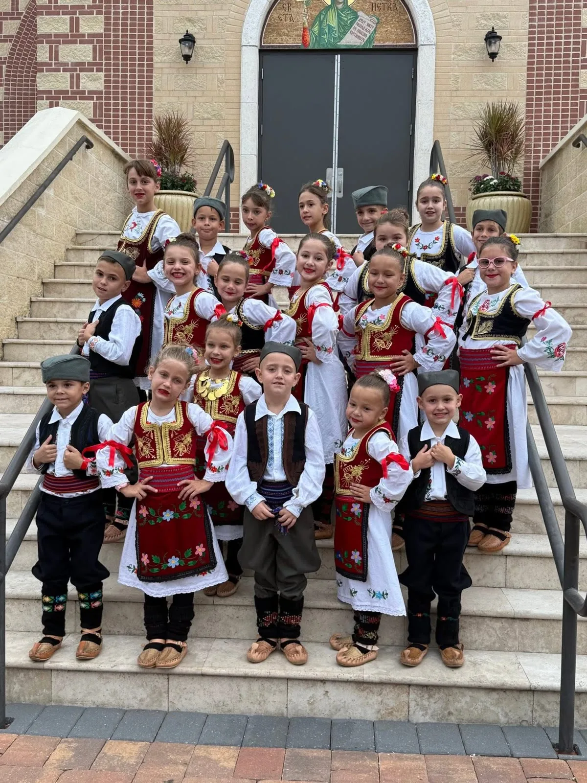 Serbian Crown Folklore Group dancing on stage